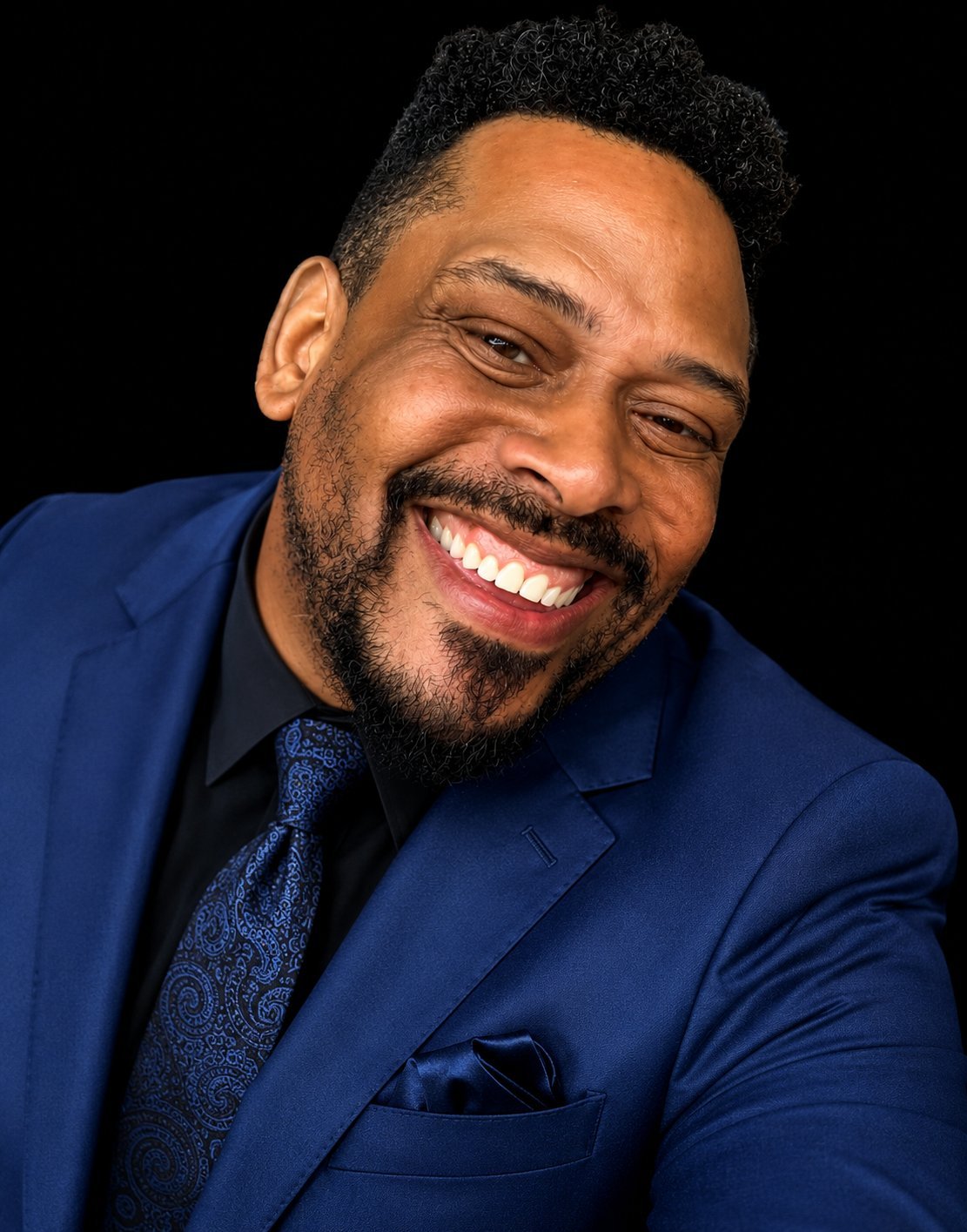 Headshot of Daryl D. Brooks in a blue suit