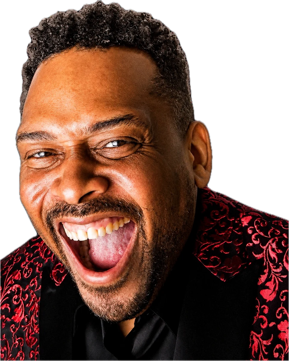 Daryl D. Brooks laughing in a red brocade jacket